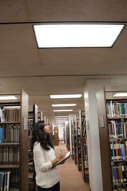 Lynae Salgado, student intern and manager for the Cal Poly Pomona team, takes notes during a lighting audit of the campus’ main library Lynae Salgado, student intern and manager for the Cal Poly Pomona team, takes notes during a lighting audit of the campus’ main library